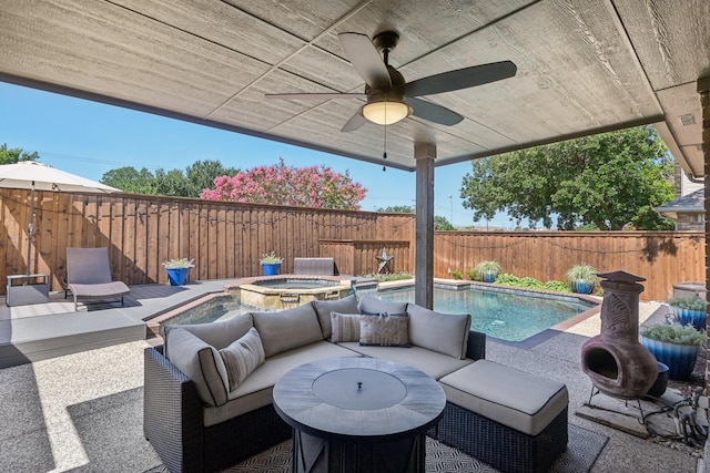 3707 Elizabeth Dr, Carrollton, TX 75007 - fenced backyard with ceiling fan, a pool with connected hot tub, and an outdoor living space