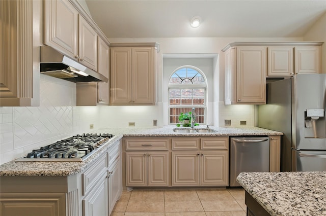 5413 Percy Priest St, Fort Worth, TX 76179 - kitchen featuring under cabinet range hood, stainless steel appliances, light tile patterned floors, and light stone counters
