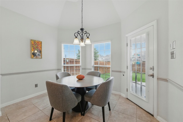 5413 Percy Priest St, Fort Worth, TX 76179 - dining area with a chandelier, light tile patterned floors, and lofted ceiling