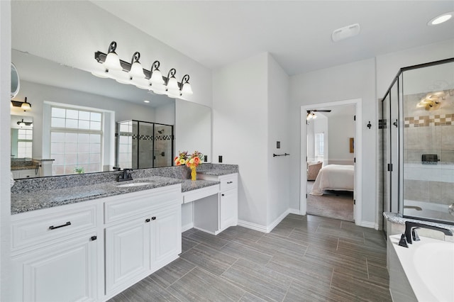 5413 Percy Priest St, Fort Worth, TX 76179 - full bath with vanity, a bath, a shower stall, ceiling fan, and ensuite bathroom
