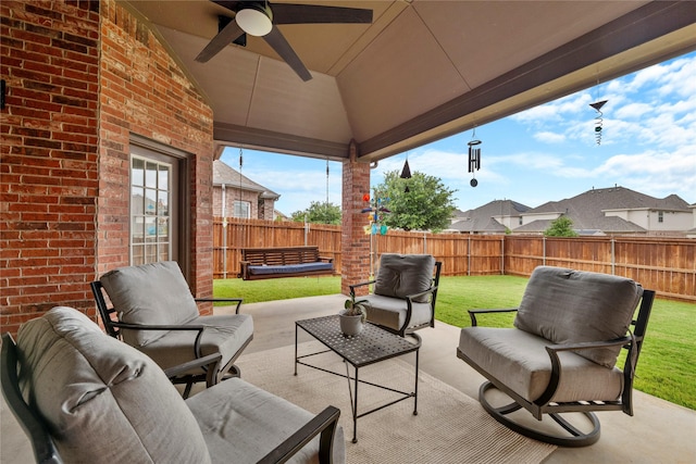 5413 Percy Priest St, Fort Worth, TX 76179 - fenced backyard featuring a patio area, ceiling fan, and an outdoor living space