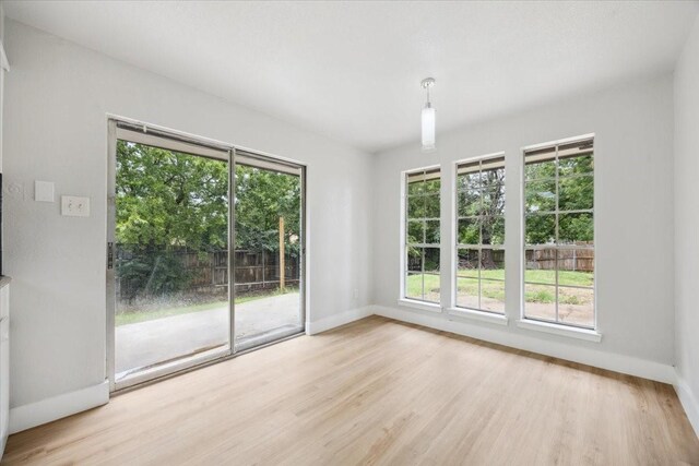 4132 Alava Dr, Fort Worth, TX 76133 - unfurnished room featuring baseboards and light wood-type flooring