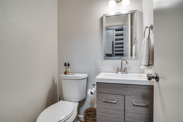 9707 Highland View Dr, Dallas, TX 75238 - half bathroom with vanity and toilet
