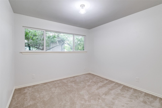 9707 Highland View Dr, Dallas, TX 75238 - spare room featuring carpet flooring