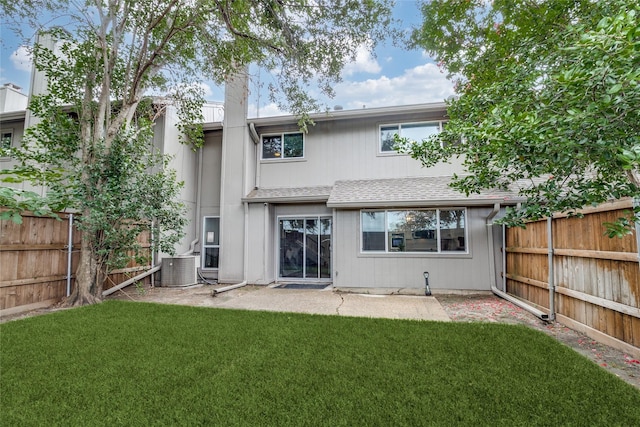 9707 Highland View Dr, Dallas, TX 75238 - rear view of property featuring a shingled roof, a fenced backyard, and a patio area