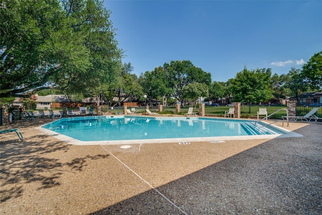 9707 Highland View Dr, Dallas, TX 75238 - community pool featuring a patio