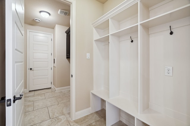 1256 Teton Dr, Burleson, TX 76028 - mudroom with baseboards and light tile patterned flooring