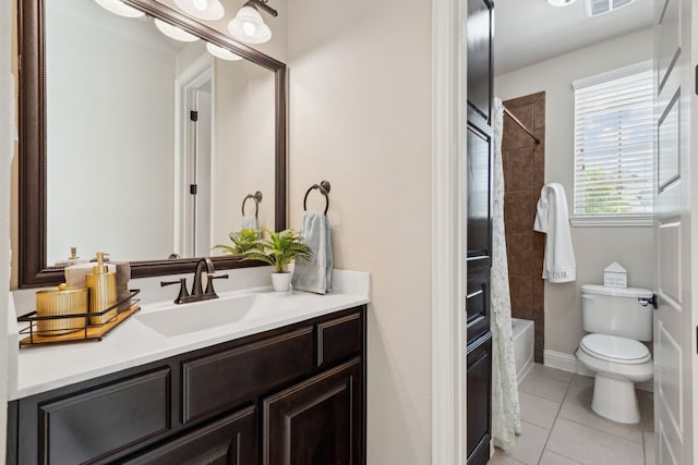 1256 Teton Dr, Burleson, TX 76028 - bathroom featuring vanity, tile patterned flooring, and shower / tub combination