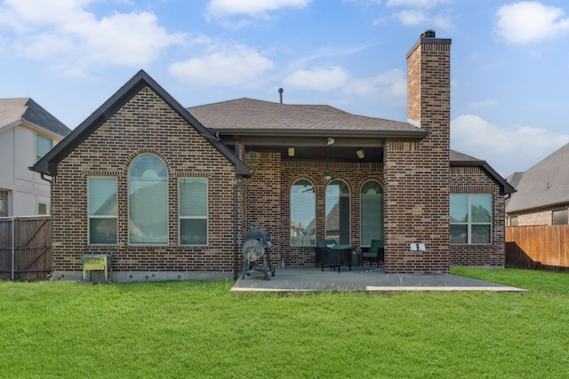 1256 Teton Dr, Burleson, TX 76028 - back of property featuring brick siding, a patio, a chimney, and a shingled roof