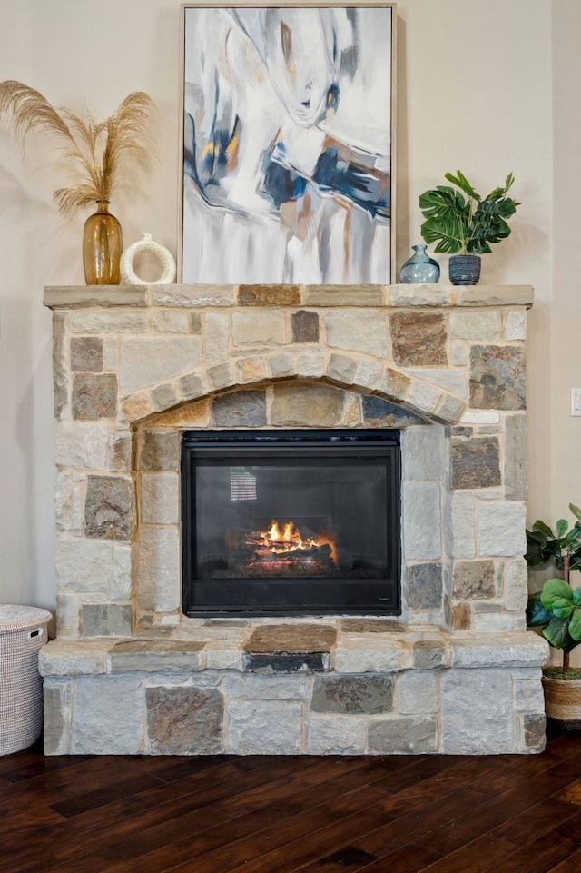 1256 Teton Dr, Burleson, TX 76028 - detailed view of a stone fireplace and wood finished floors