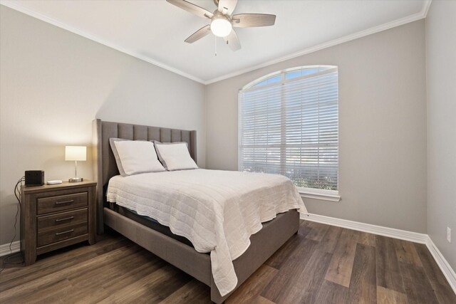 1005 Prairie Ln, Mcgregor, TX 76657 - bedroom featuring dark wood finished floors, ornamental molding, and a ceiling fan