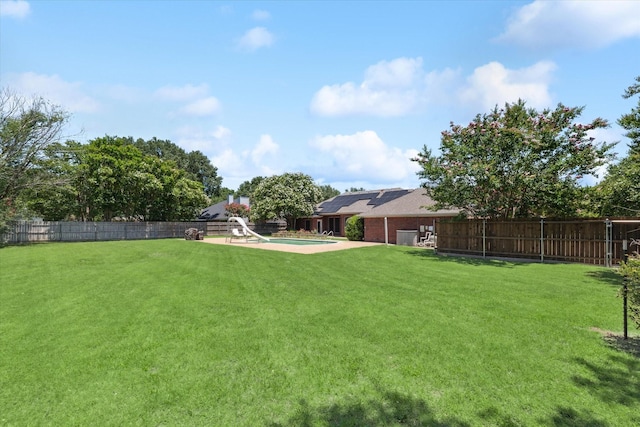 1005 Prairie Ln, Mcgregor, TX 76657 - fenced backyard with a patio area