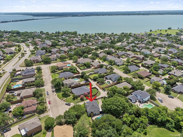 1045 Hillcrest Cir, Rockwall, TX 75087 - aerial perspective of suburban area with a large body of water