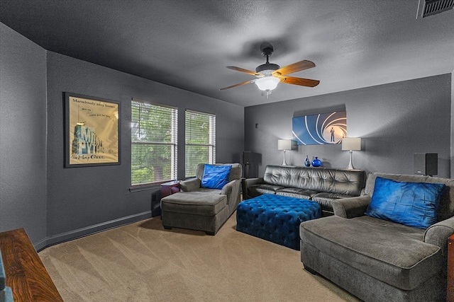 1045 Hillcrest Cir, Rockwall, TX 75087 - sitting room featuring a textured wall, carpet floors, a ceiling fan, and a textured ceiling