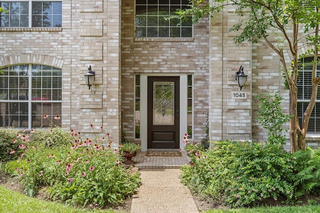 1045 Hillcrest Cir, Rockwall, TX 75087 - doorway to property with brick siding