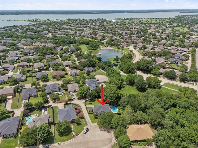 1045 Hillcrest Cir, Rockwall, TX 75087 - aerial overview of property's location with a nearby body of water and nearby suburban area