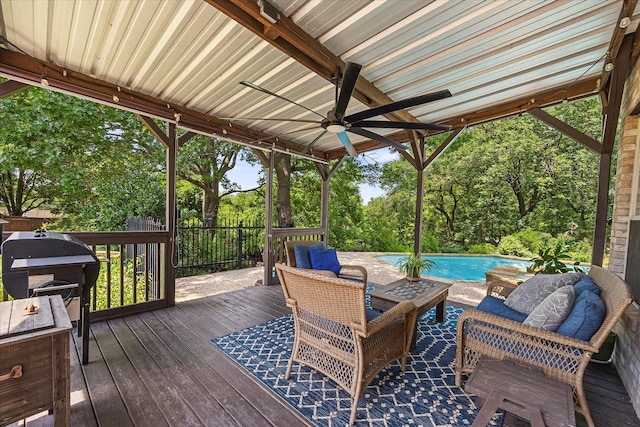 1045 Hillcrest Cir, Rockwall, TX 75087 - wooden terrace with an outdoor pool, ceiling fan, and grilling area