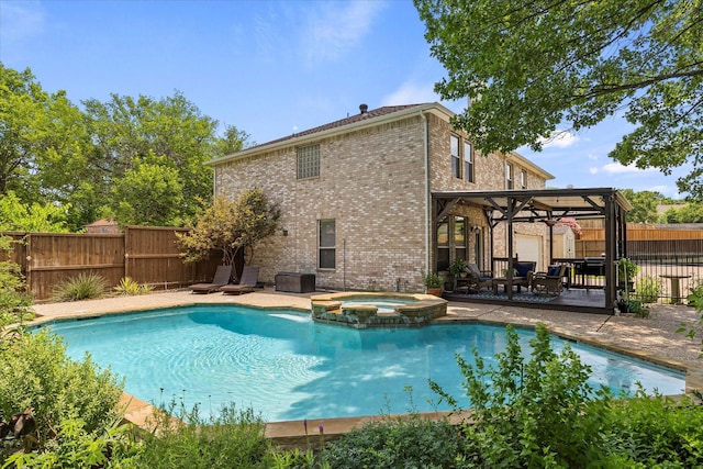 1045 Hillcrest Cir, Rockwall, TX 75087 - view of pool featuring a fenced backyard, a pool with connected hot tub, and a patio