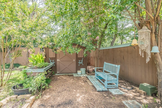 2057 Breezywood Dr, Flower Mound, TX 75022 - fenced backyard with a storage shed