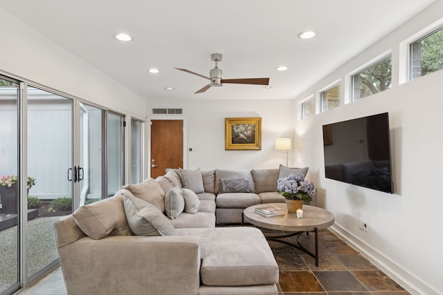 10832 Cinderella Ln, Dallas, TX 75229 - living room featuring recessed lighting, a ceiling fan, and dark stone finish floors