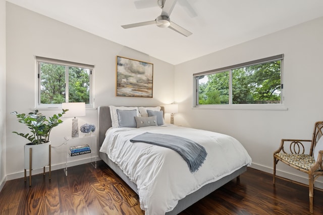 10832 Cinderella Ln, Dallas, TX 75229 - bedroom featuring dark wood-style floors, vaulted ceiling, and ceiling fan
