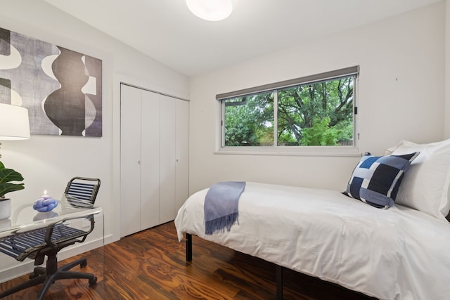 10832 Cinderella Ln, Dallas, TX 75229 - bedroom with wood finished floors, a closet, and a desk