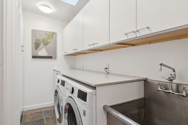 10832 Cinderella Ln, Dallas, TX 75229 - washroom with cabinet space, separate washer and dryer, and dark stone finish floors