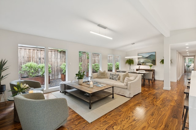 10832 Cinderella Ln, Dallas, TX 75229 - living room featuring beam ceiling and wood finished floors