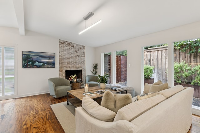 10832 Cinderella Ln, Dallas, TX 75229 - living room featuring wood finished floors and a fireplace
