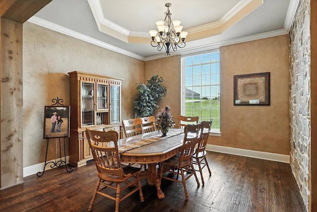 12780 Cartwright Trl, Ponder, TX 76259 - dining area featuring dark wood-style floors, a tray ceiling, a chandelier, and ornamental molding