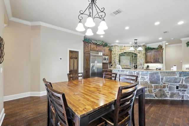 12780 Cartwright Trl, Ponder, TX 76259 - dining space featuring a chandelier, crown molding, dark wood-style floors, and recessed lighting