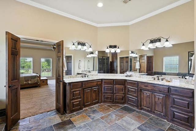 12780 Cartwright Trl, Ponder, TX 76259 - full bathroom featuring connected bathroom, stone finish floors, crown molding, double vanity, and a stall shower