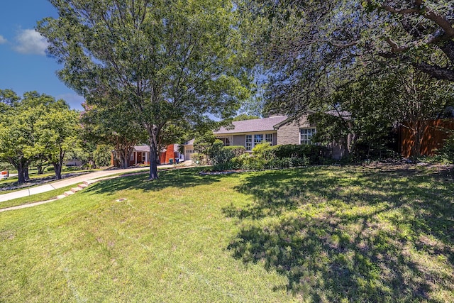 6420 Waverly Way, Fort Worth, TX 76116 - view of front facade featuring a front yard and a garage