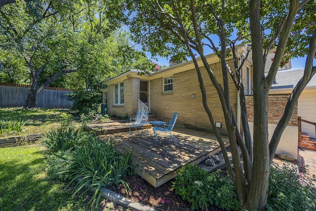 6420 Waverly Way, Fort Worth, TX 76116 - rear view of house featuring a deck and brick siding