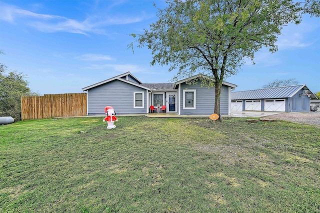 2212 Fred Smith Pkwy, Celina, TX 75009 - ranch-style home with a garage, an outbuilding, and driveway