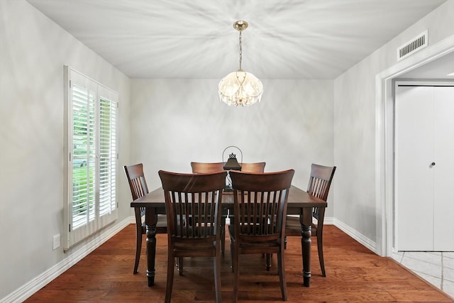 4201 Blackwillow Dr, Mesquite, TX 75150 - dining space featuring a chandelier and wood finished floors