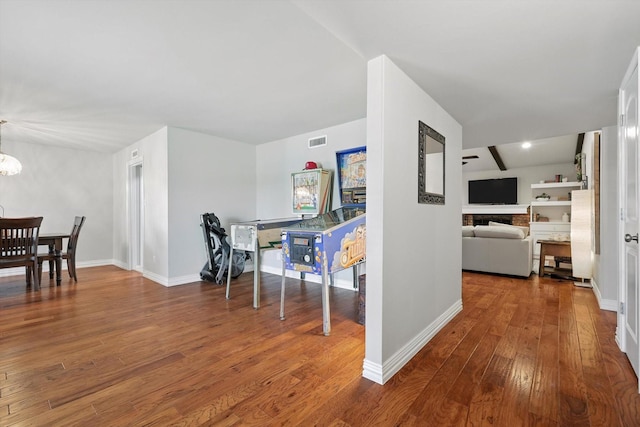 4201 Blackwillow Dr, Mesquite, TX 75150 - hall featuring wood finished floors and a chandelier