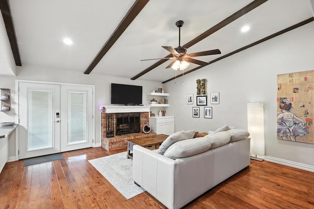 4201 Blackwillow Dr, Mesquite, TX 75150 - living room with ceiling fan, french doors, wood finished floors, and a fireplace