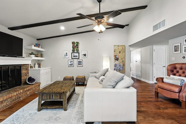 4201 Blackwillow Dr, Mesquite, TX 75150 - living area with a ceiling fan, beam ceiling, wood finished floors, a fireplace, and high vaulted ceiling