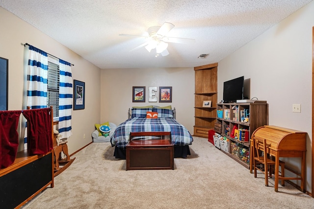 730 Cedar Crk, Reno, TX 75462 - bedroom with carpet floors, a textured ceiling, and a ceiling fan