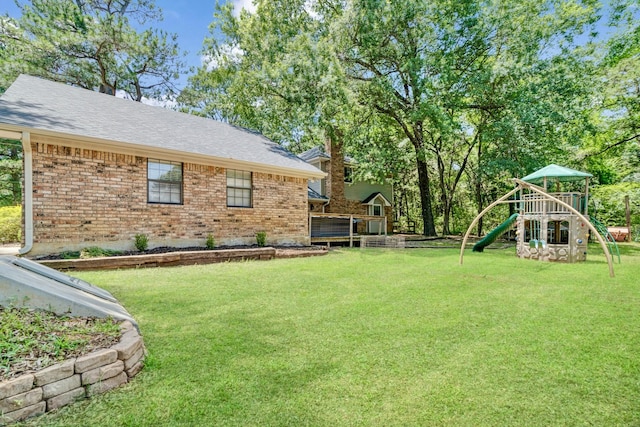 730 Cedar Crk, Reno, TX 75462 - view of green lawn featuring a playground