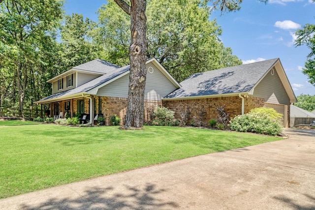 730 Cedar Crk, Reno, TX 75462 - view of front of property featuring brick siding, a porch, a front lawn, and a shingled roof