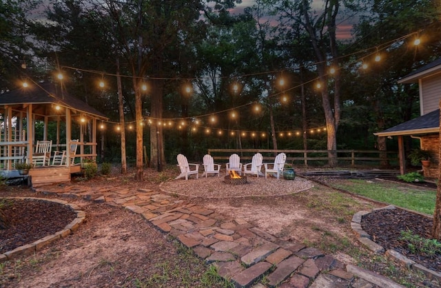 730 Cedar Crk, Reno, TX 75462 - view of yard featuring an outdoor fire pit and a patio