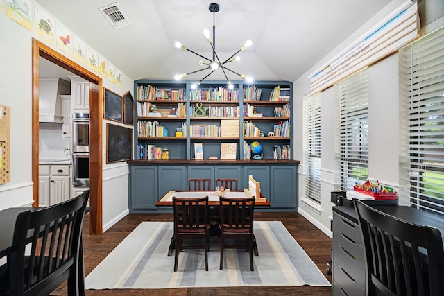 730 Cedar Crk, Reno, TX 75462 - dining space with lofted ceiling, a chandelier, and dark wood-type flooring