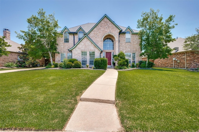 214 Chisholm Trl, Argyle, TX 76226 - view of front of home with a front yard and brick siding