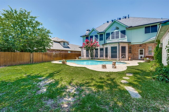 214 Chisholm Trl, Argyle, TX 76226 - back of house featuring a fenced backyard, a patio, brick siding, and a chimney