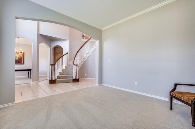 214 Chisholm Trl, Argyle, TX 76226 - carpeted entrance foyer with arched walkways, stairs, crown molding, tile patterned flooring, and a chandelier