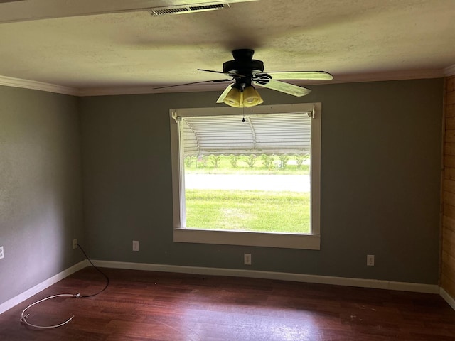 1330 Palmetto Rd, Benton, LA 71006 - empty room featuring dark wood-type flooring, ceiling fan, ornamental molding, and a textured ceiling