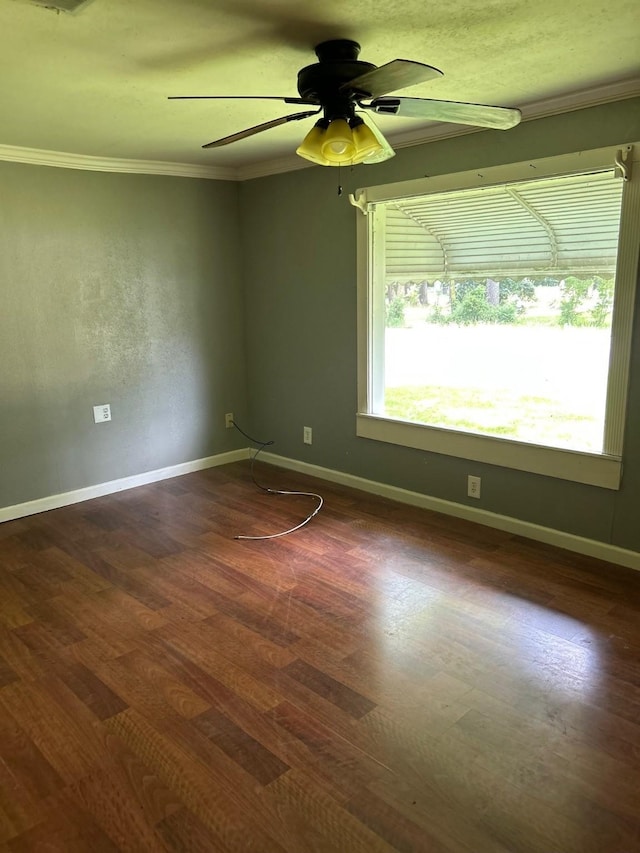 1330 Palmetto Rd, Benton, LA 71006 - empty room featuring dark wood-type flooring, crown molding, and ceiling fan