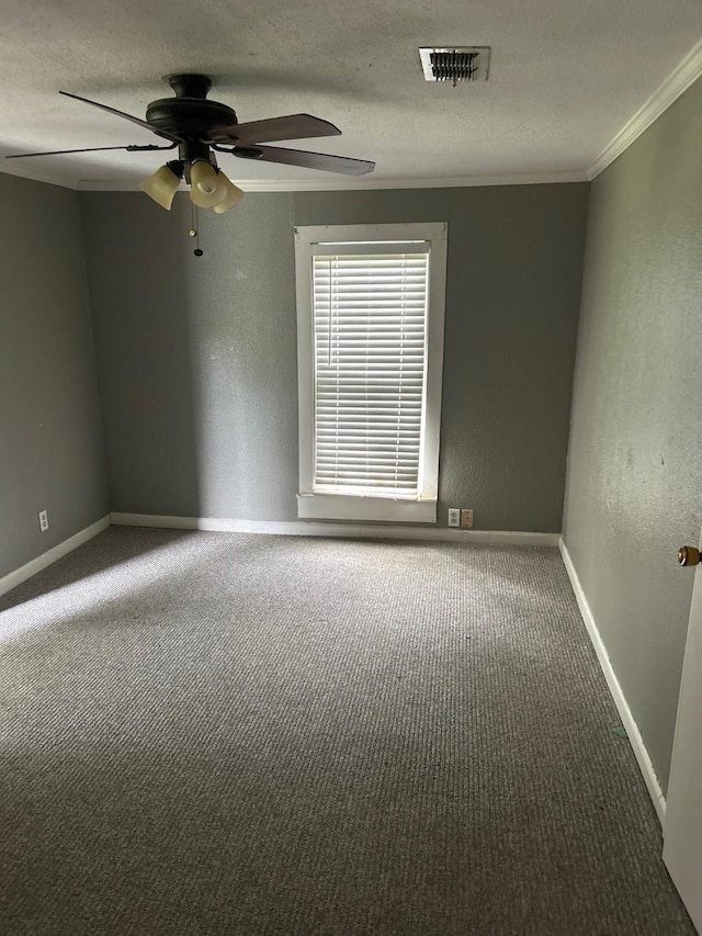 1330 Palmetto Rd, Benton, LA 71006 - carpeted empty room with ceiling fan, crown molding, a textured ceiling, and a textured wall